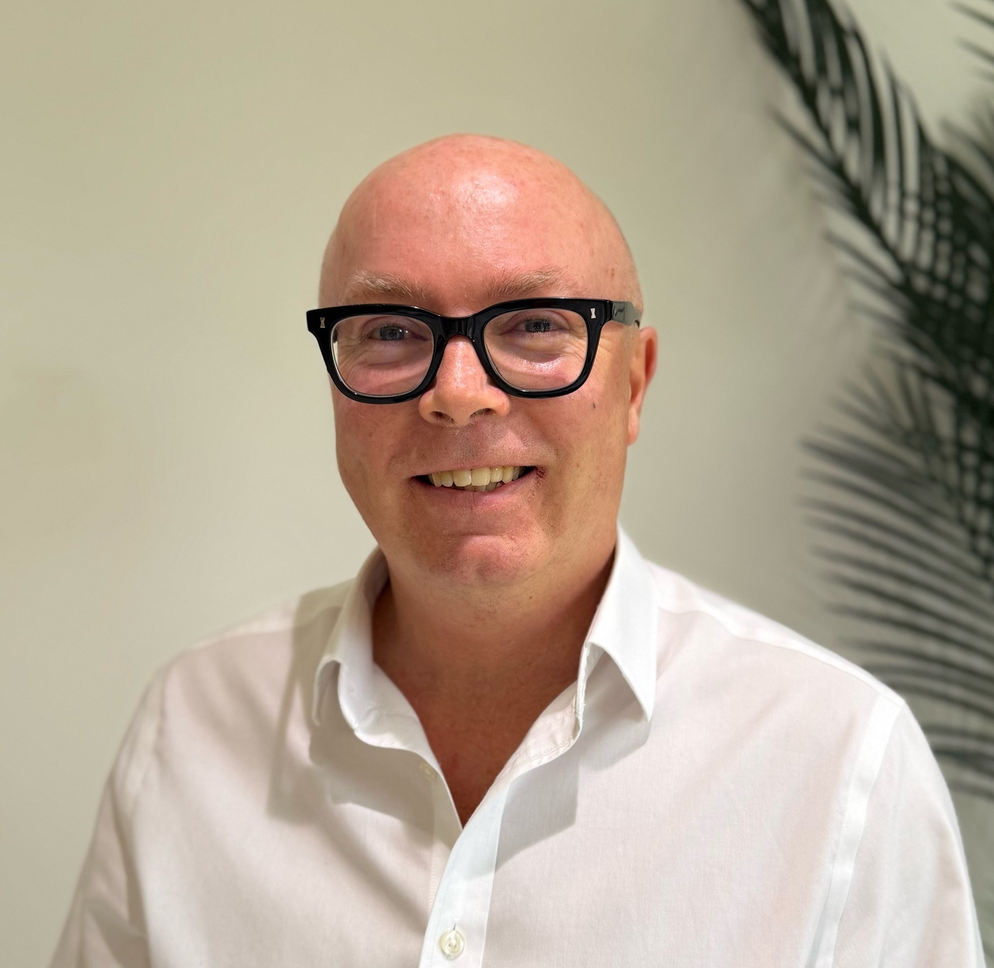 105e2c80-ba16-4f26-884f-f3c07d1cb6c3-headshot-MH-photo-2026-5b9598